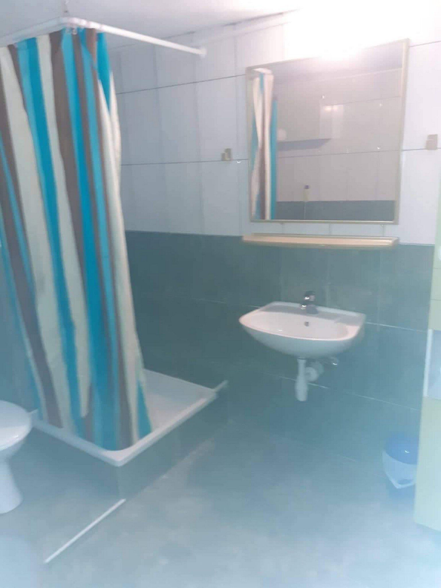 Apartment (Two Bedroom Apartment with Balcony an) | Bathroom | Shower, towels