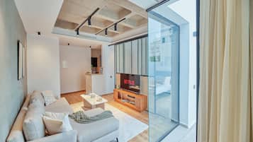 Superior Apartment | Living area | 46-inch Smart TV with satellite channels, TV