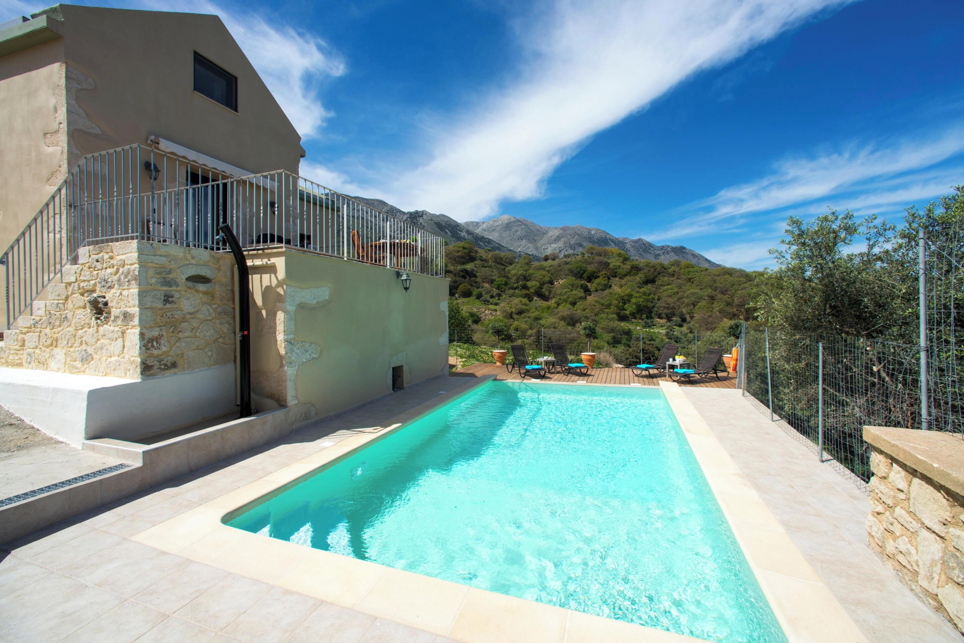 Seasonal outdoor pool, pool loungers
