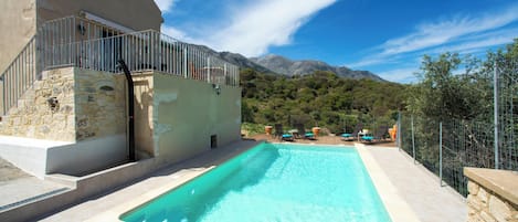 Seasonal outdoor pool, sun loungers