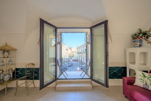 Suite d'Hotel con stupenda vista sulle Terme Romane e la Cupola della Cattedrale