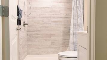 Shower, towels, toilet paper