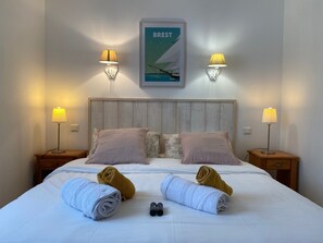 4 habitaciones, tabla de planchar con plancha y cuna de viaje