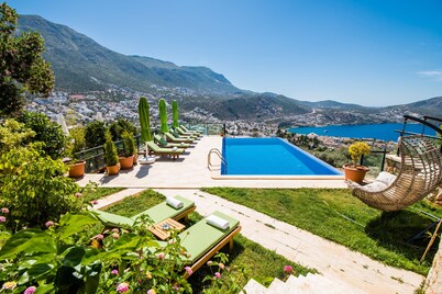 Hillside sea view family villa with stunning views and close to town