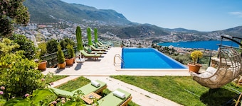 Hillside sea view family villa with stunning views and close to town