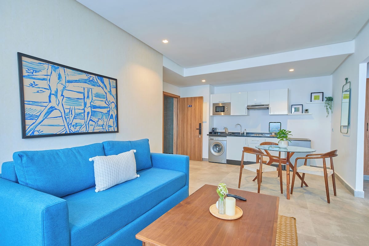 Superior Apartment | Living area | 46-inch Smart TV with satellite channels, TV