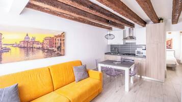 Design Apartment | Living area | 28-inch flat-screen TV with digital channels, TV