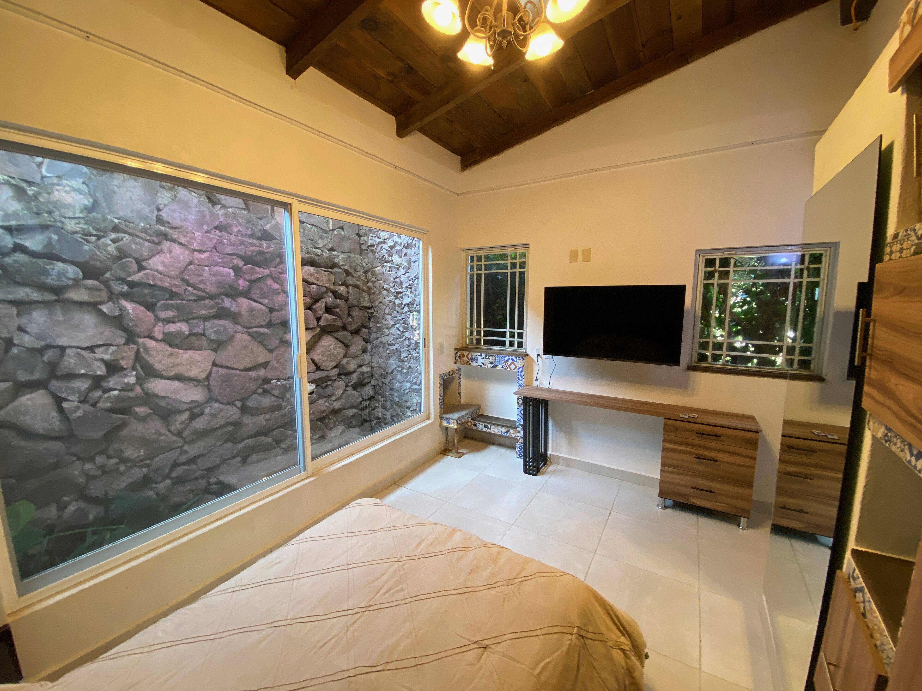 Premium bedding, down comforters, Tempur-Pedic beds, minibar