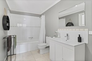 Bathtub, hair dryer, towels
