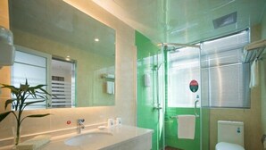 A modern bathroom with a glass-enclosed shower, a large mirror, and a white sink. - Greentree Inn Jiangsu Suzhou Zhangjiagang Tangshi Town Yangzi Road Express Hotel (Suzhou)