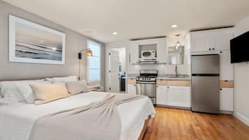 1 habitación, tabla de planchar con plancha, wifi y ropa de cama