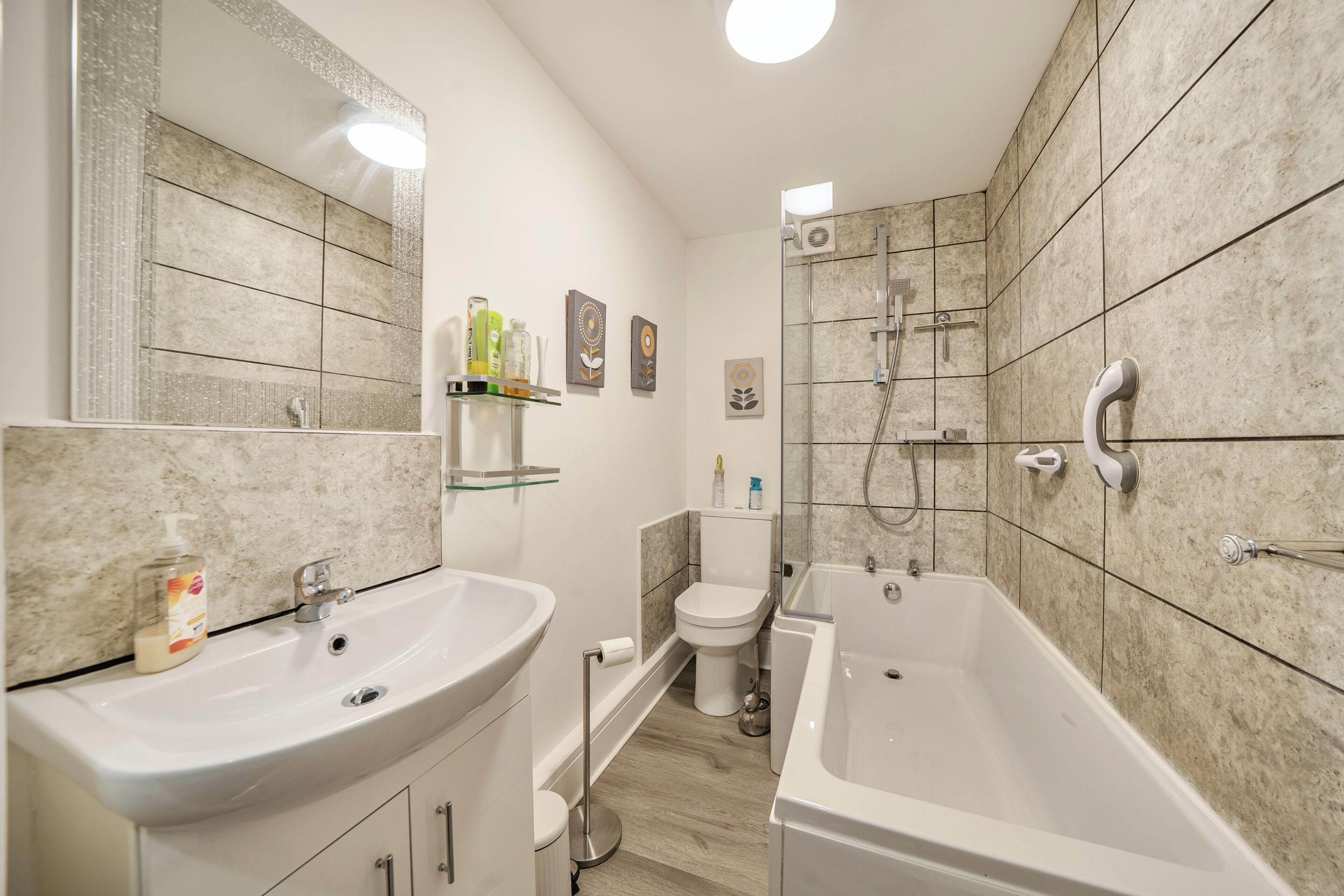 Combined shower/bathtub, deep-soaking bathtub, hair dryer, towels