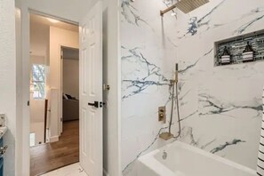 Shower, hair dryer, bidet, towels