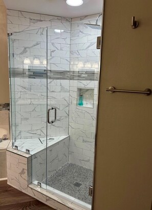 Shower, hair dryer, towels, soap