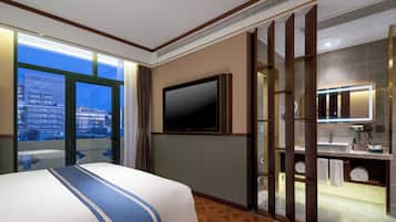 Down duvets, memory-foam beds, desk, laptop workspace