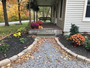 Sit on the porch and enjoy the serene surroundings.