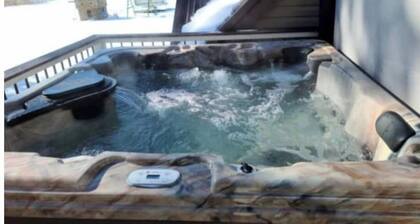 Your summer family retreat- with a hot tub!
