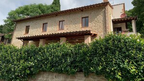 A stone building with a flat roof, multiple windows, and a satellite dish. - Farmhouse "Parulia Country House - Estia" with Shared Pool, Shared Terrace & Wi-Fi (Molin Nuovo)