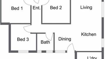 A floor plan with three bedrooms, a living area, a kitchen, a dining area, a bathroom, and a laundry room.