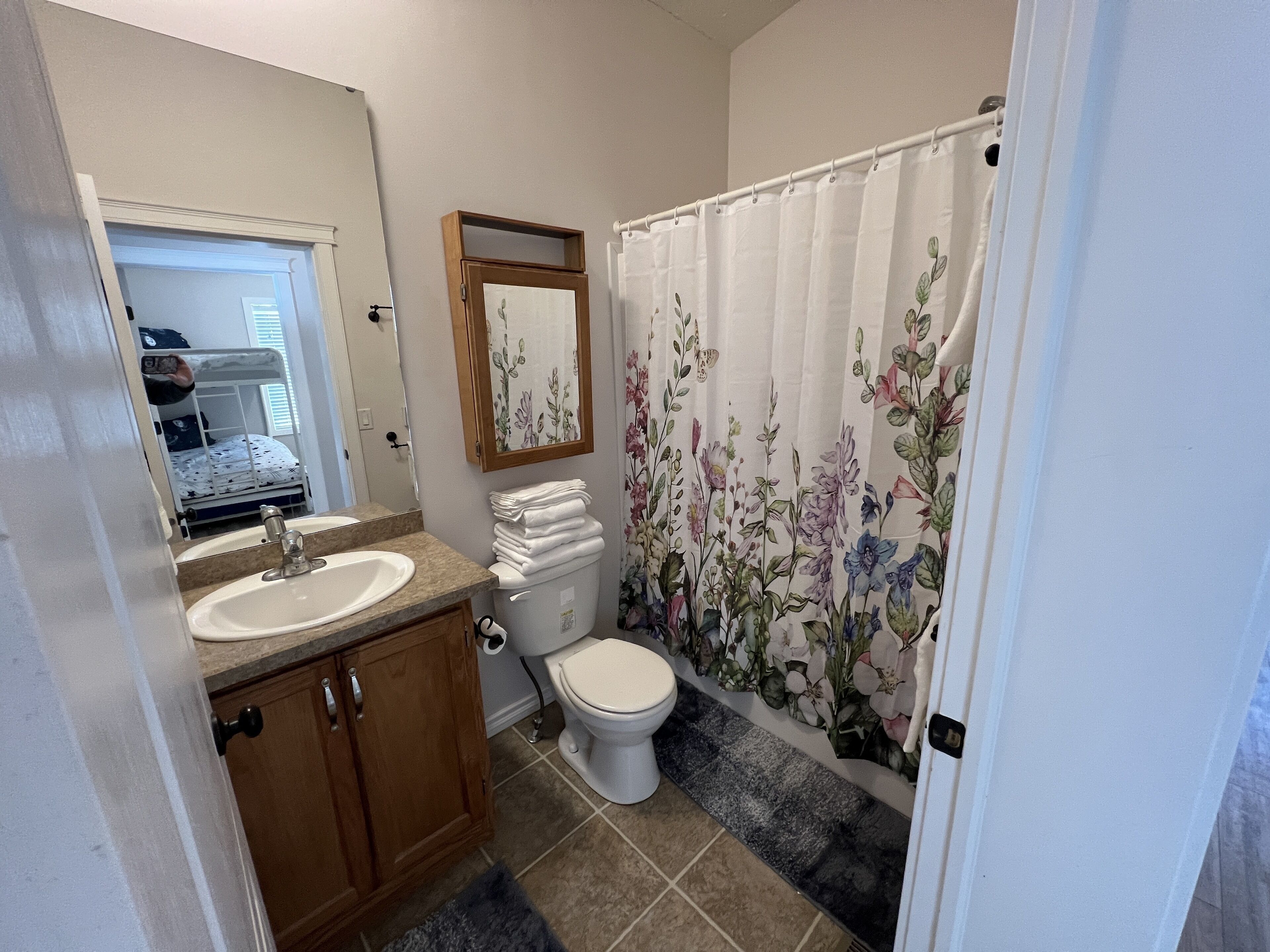 Hair dryer, towels, soap, shampoo