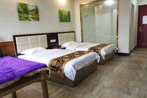 A hotel room with two beds, a shower area, and a door. - Mingcheng Home Business Hotel (Hefei)