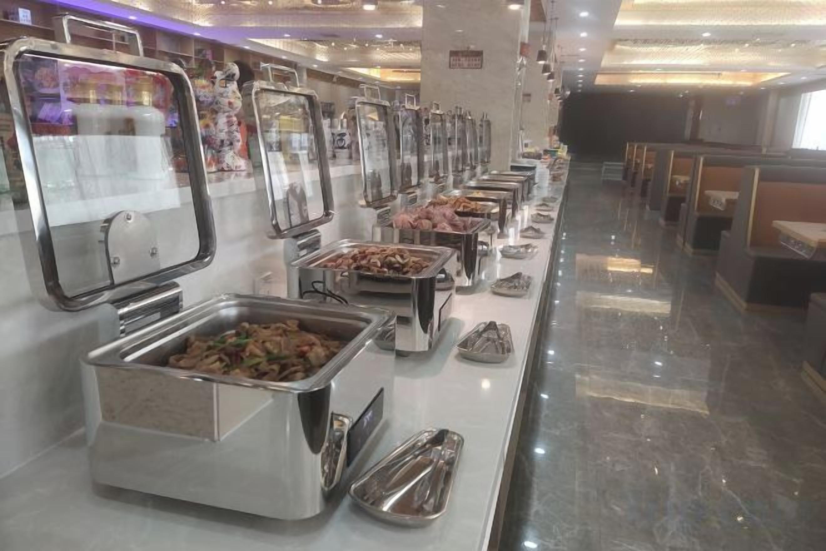 A buffet area with multiple food service stations.