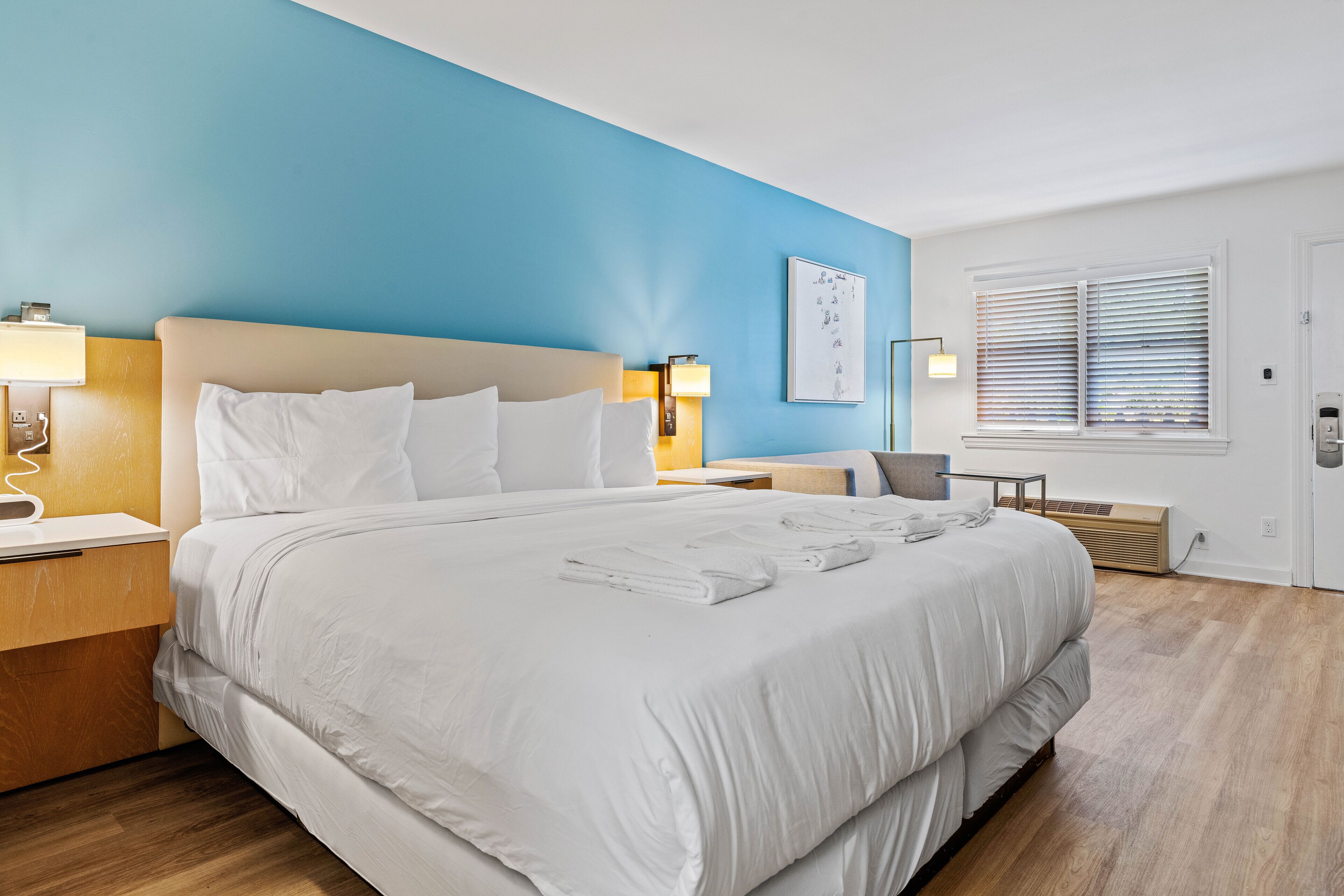 Desk, laptop workspace, blackout drapes, iron/ironing board