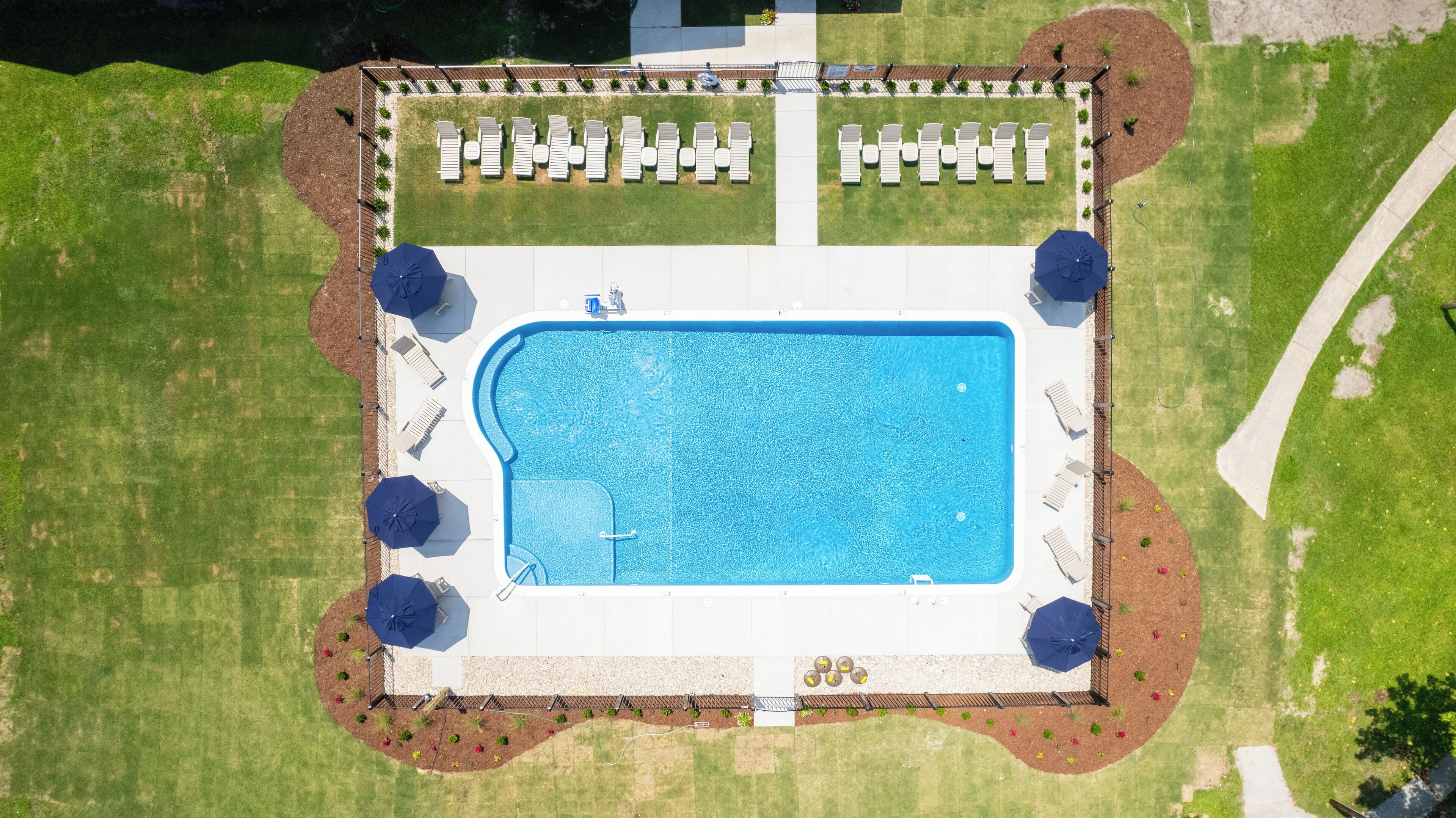 Seasonal outdoor pool, open 7:00 AM to 10:00 PM, pool umbrellas
