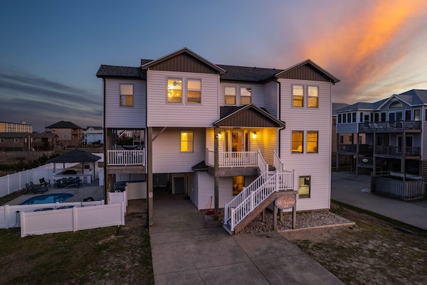 Golden skies, coastal charm, and your perfect OBX getaway await at SEA-esta—a warm and inviting beach retreat designed for rest, fun, and unforgettable family memories.
