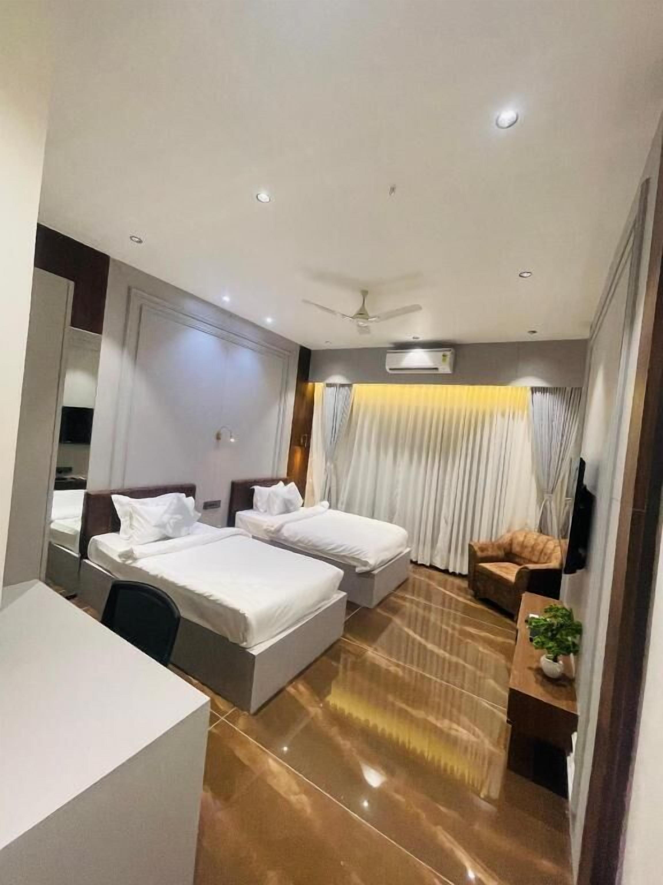 Premium bedding, desk, laptop workspace, soundproofing