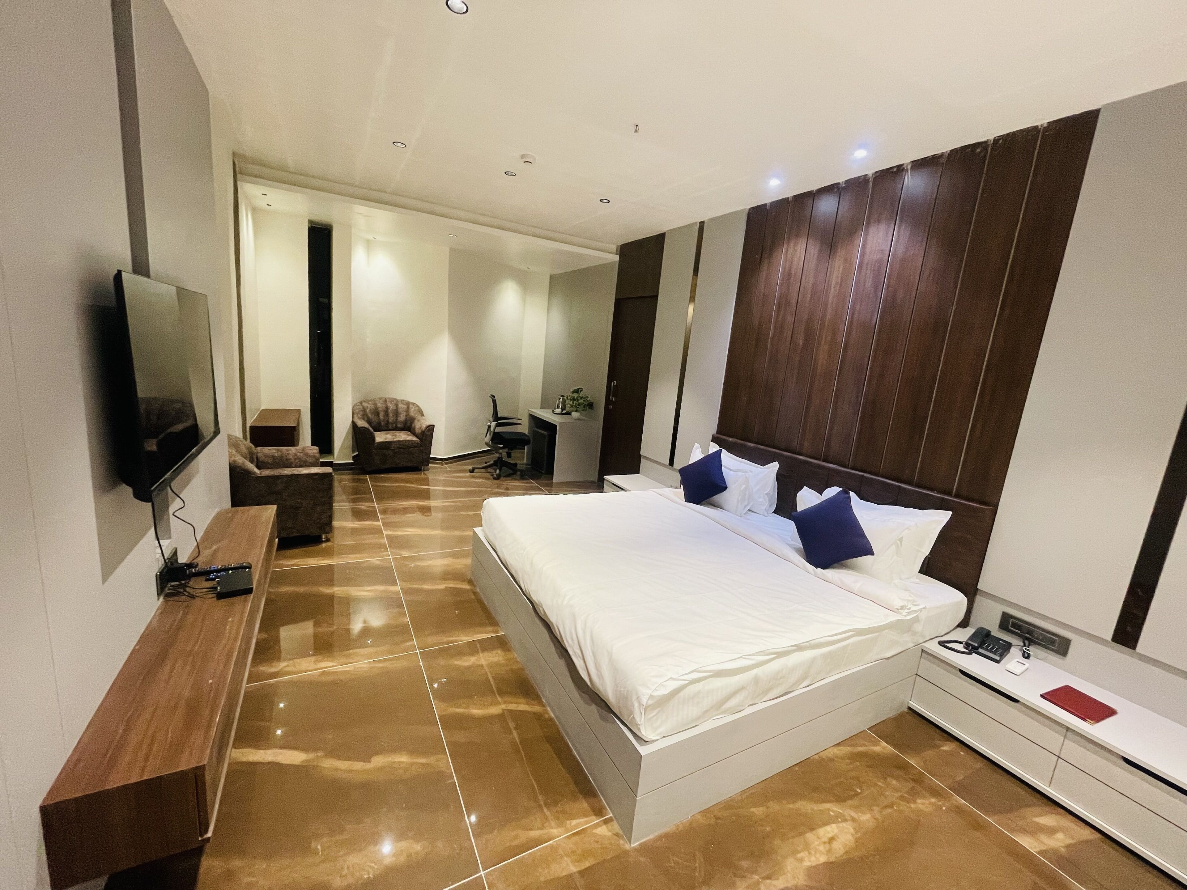 Premium bedding, desk, laptop workspace, soundproofing