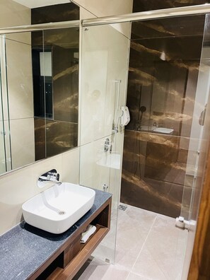 Superior Deluxe King Room | Bathroom | Free toiletries, hair dryer, towels, shampoo - VITS Jamnagar (Lalpur)
