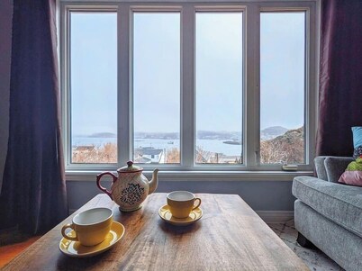 On the Rocks Overlooking the Sea