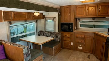 Deluxe Mobile Home | Private kitchen | Full-size fridge, microwave, stovetop, coffee/tea maker