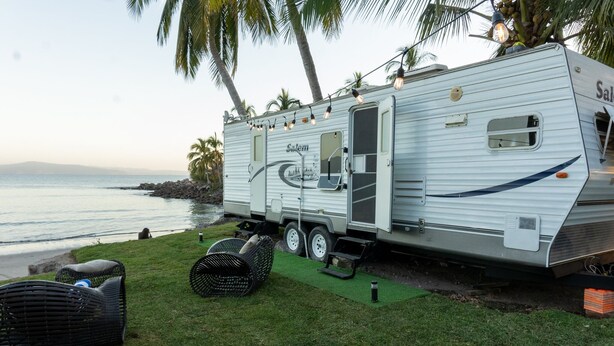 A white RV with the name 'Salem' parked by the beach. - San Blas RV Park Frente al Mar (San Blas)