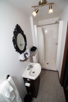 Shower, towels, toilet paper