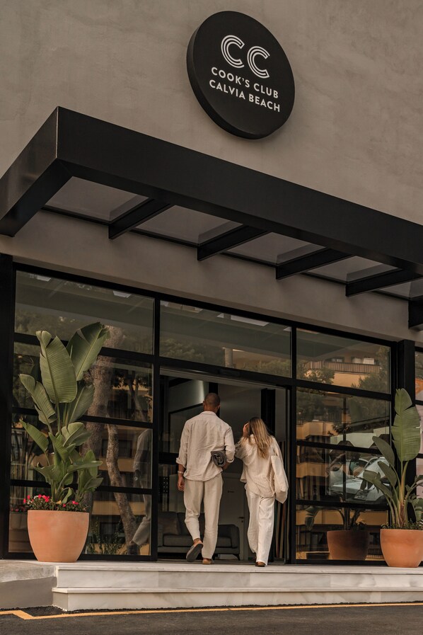 A modern building entrance with a sign reading "Cook's Club Calvia Beach". - Cook's Club Calvia Beach Adults Only +21 (Calvia)