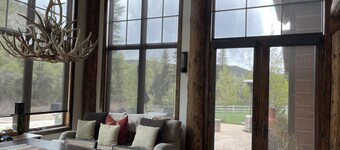 Modern Chalet on the River. Hot Tub, Fireplace , Newly furnished Fishing, Hiking