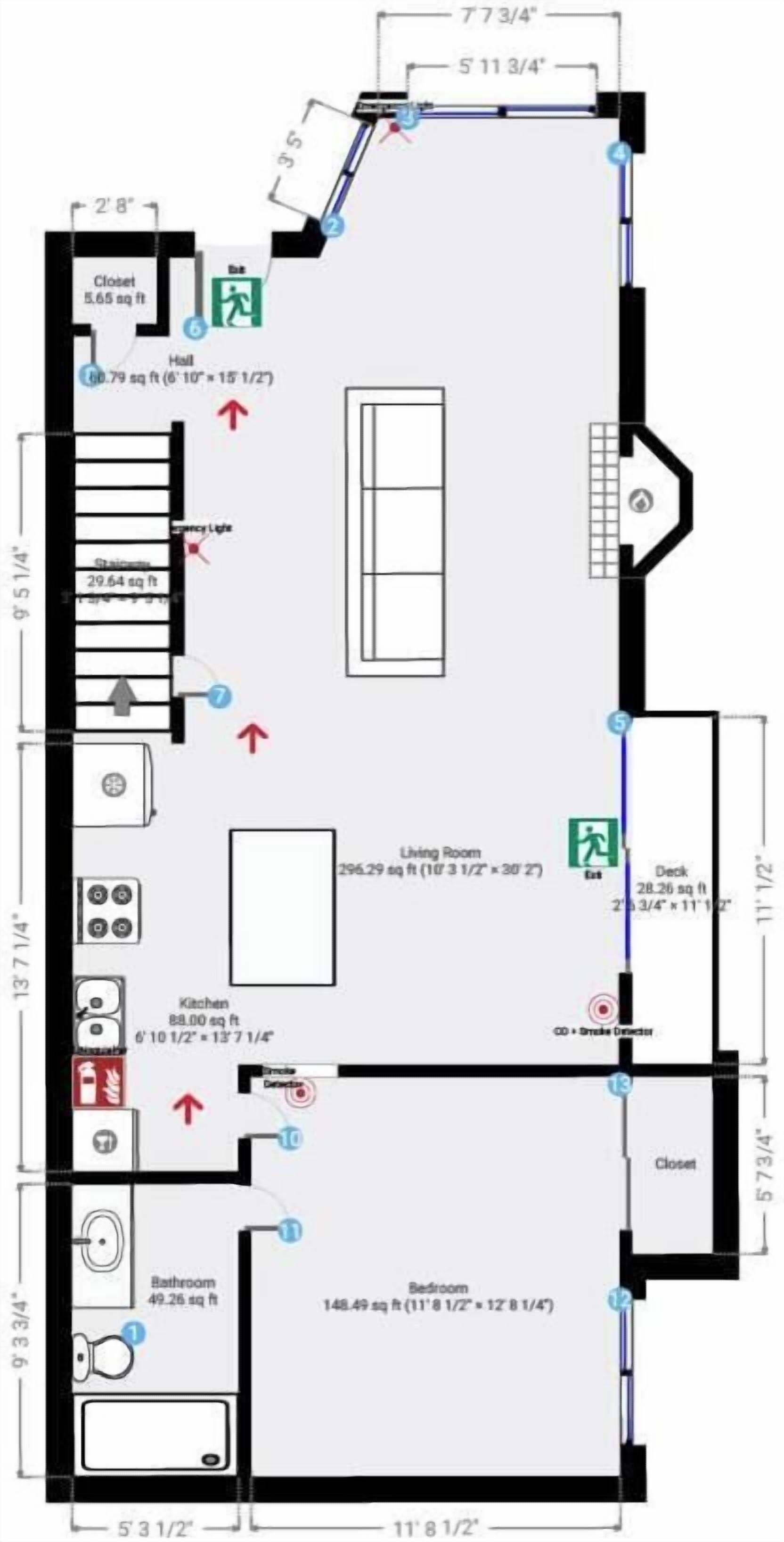 A floor plan of a hotel room with a closet, bathroom, kitchen, living room, and a deck.