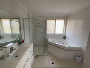 Shower, jetted tub, hair dryer, bidet