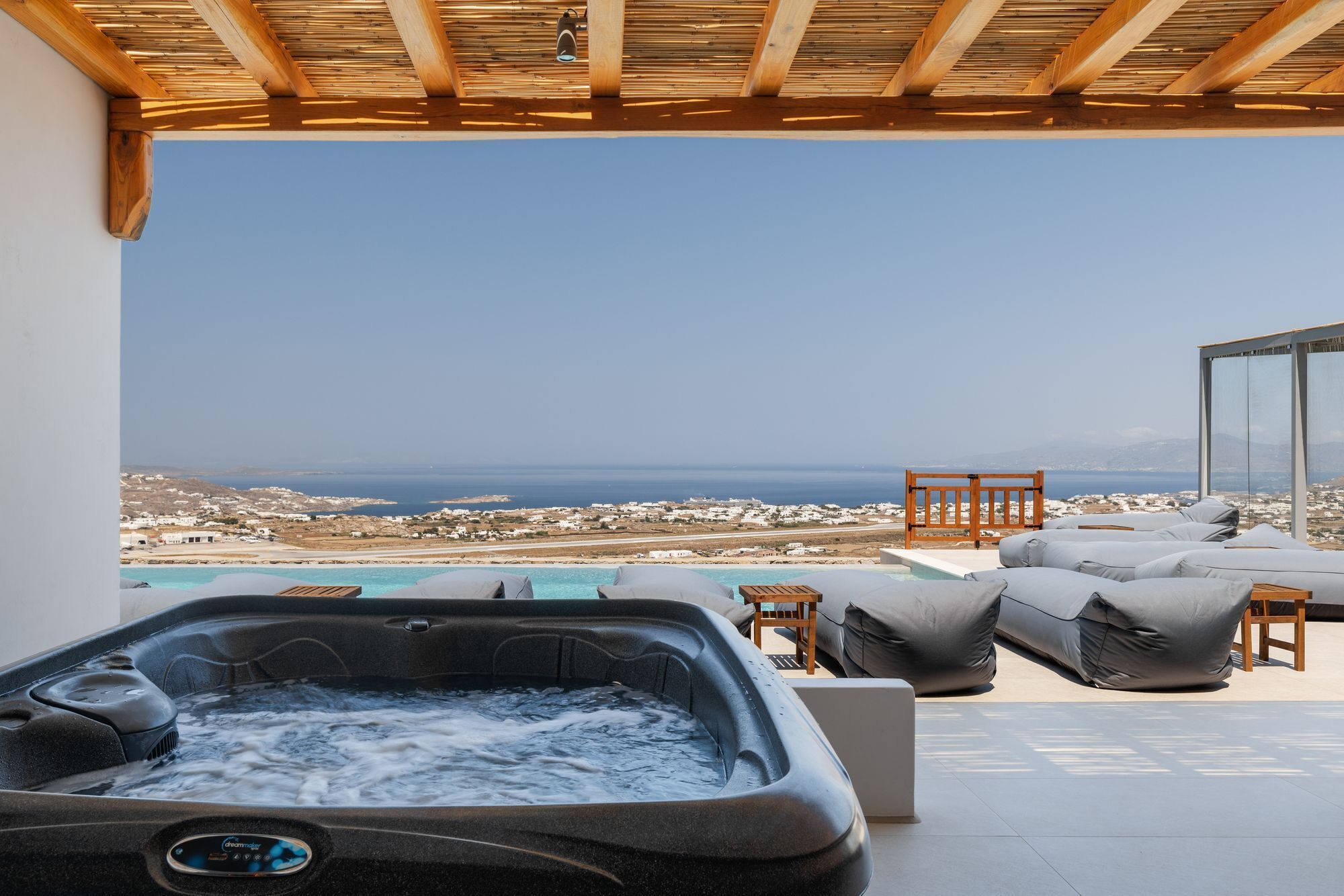 superior suite with sea and pool view & outdoor hot tub | terrace/patio