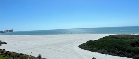 On the beach, sun loungers, beach towels