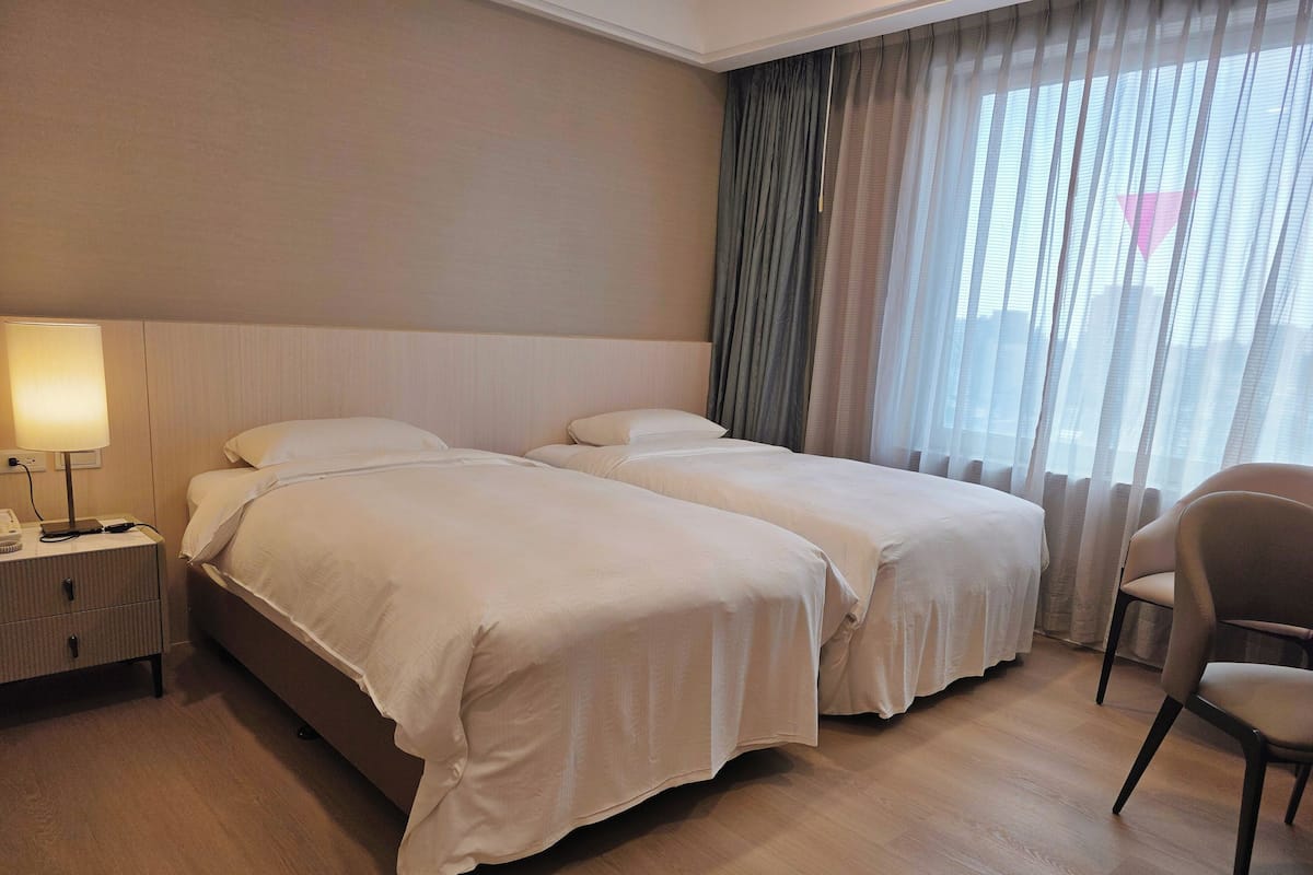 Eenvoudige Twin kamer, 2 eenpersoonsbedden | 1 slaapkamer, luxe beddengoed, donzen dekbedden, pillowtop-bedden