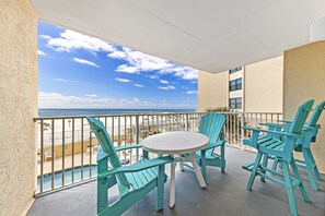 Outdoor dining - Beachfront Condo | Outdoor Pool | Bonus Bunks | My Beach Getaways (Gulf Shores)
