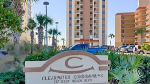 A sign for Clearwater Condominiums at 517 East Beach Blvd.