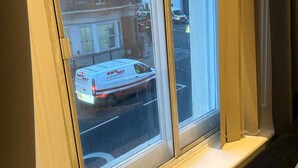 A window with a view of a street and a parked van. - Immaculate 1-bed Apartment in the Heart of Chelsea (London)