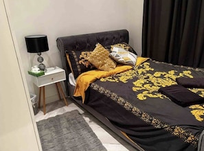 Departamento, 1 cama Queen size | 1 habitación, tabla de planchar con plancha, wifi gratis y ropa de cama
