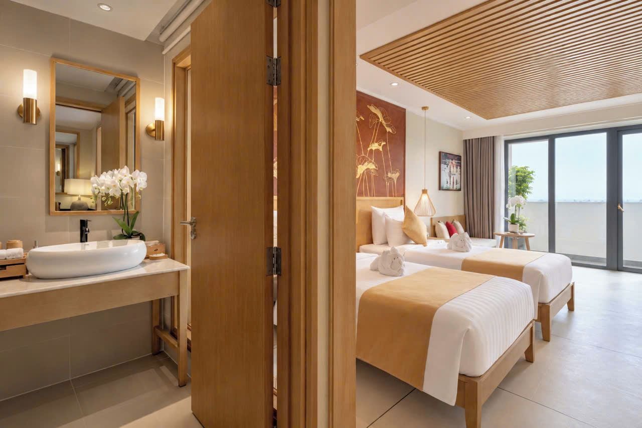 A hotel room with a large window, a wooden ceiling, and two beds.