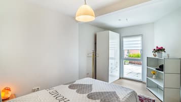 1 habitación, tabla de planchar con plancha, wifi gratis y ropa de cama