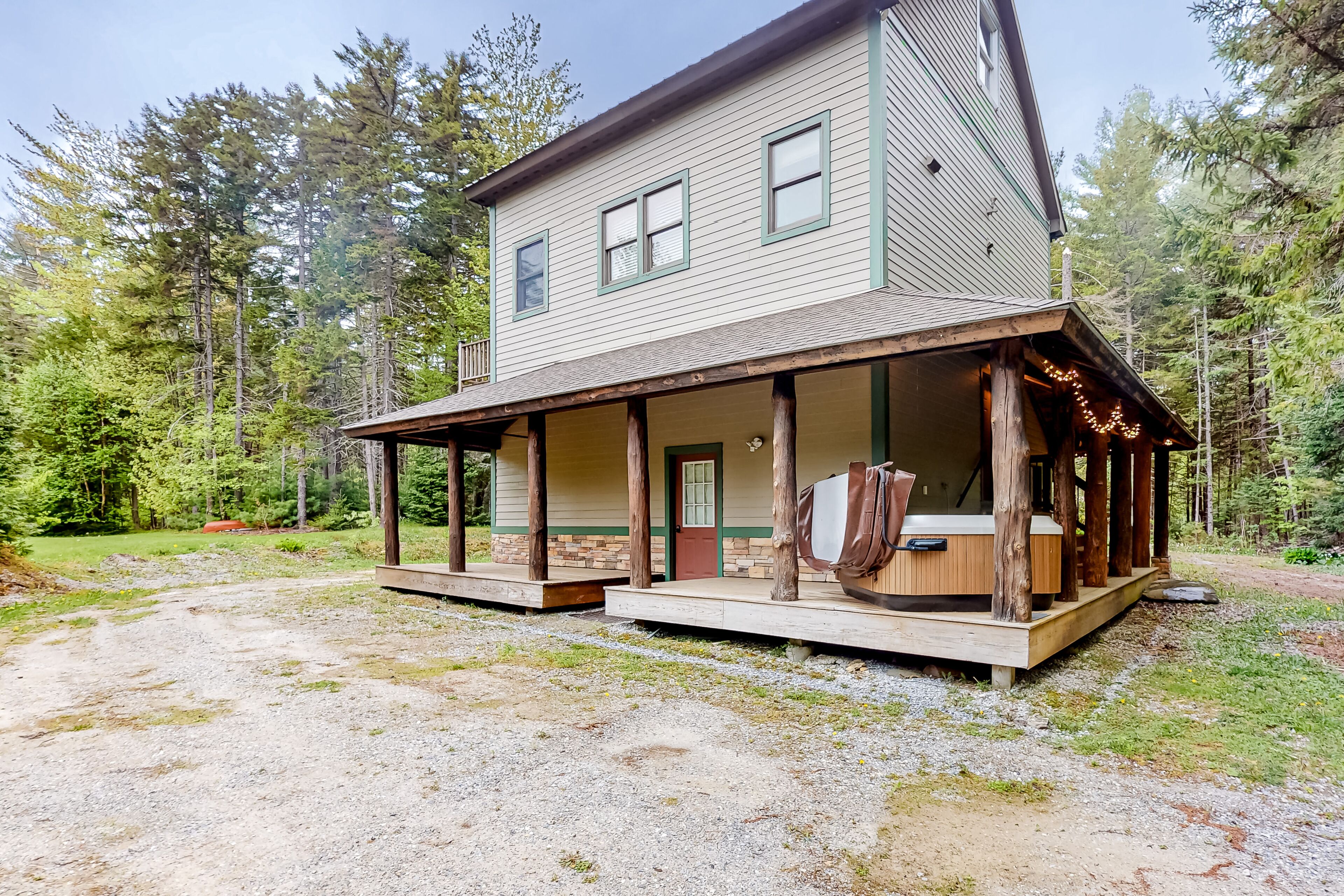 Three-level dog-friendly getaway with a private hot tub, fireplace, & W/D